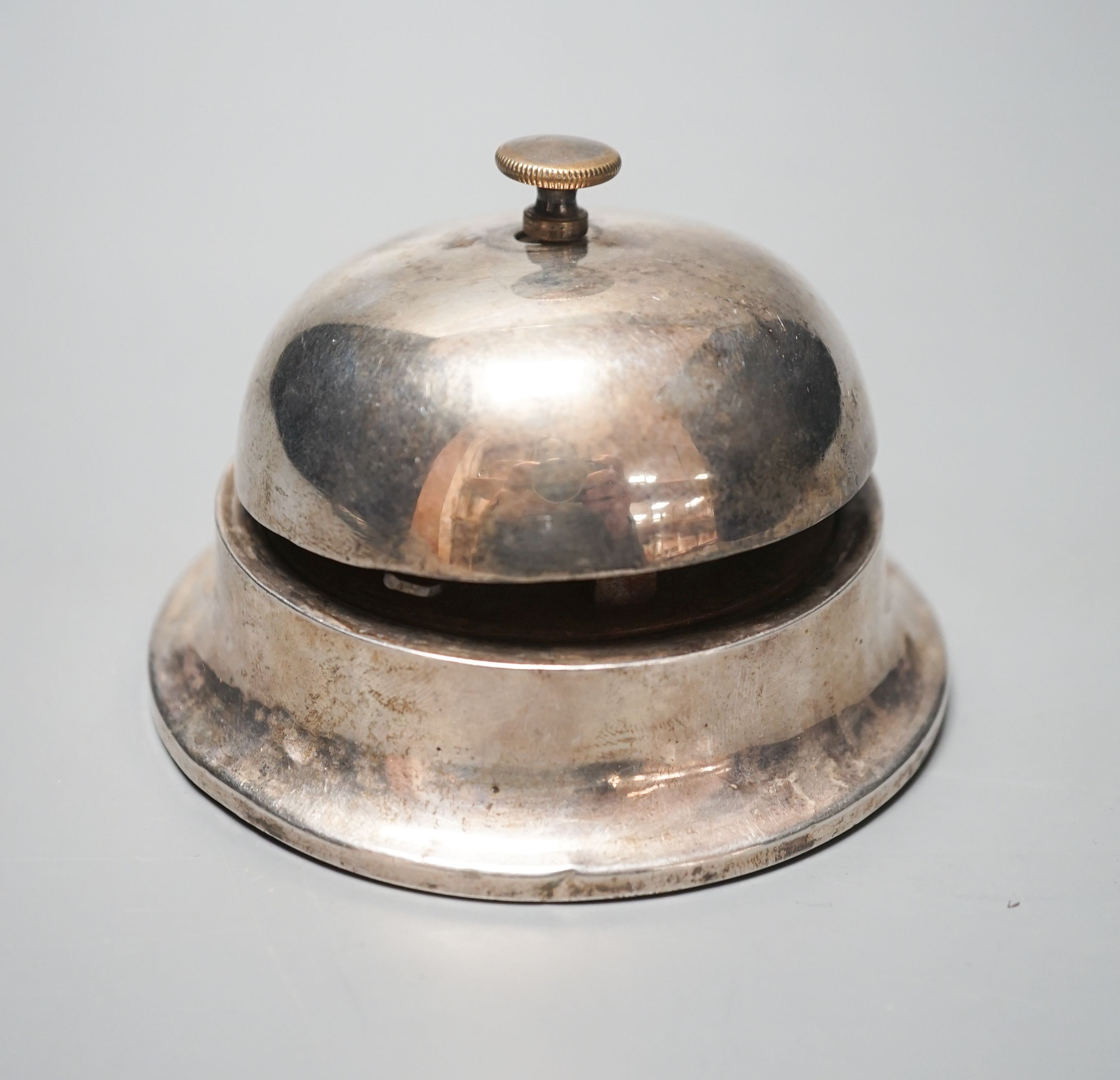 A George V silver mounted table bell, Birmingham, 1914, 88mm.